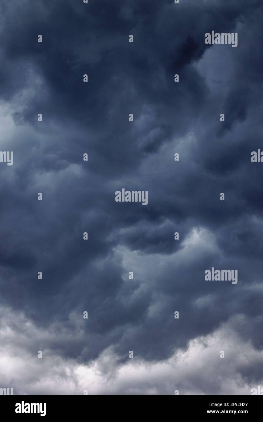 Dark stormy clouds covering the sky before rain Stock Photo