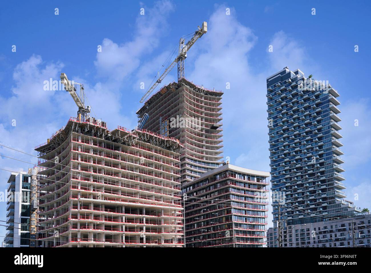 Modern high rise apartment buildings under construction Stock Photo