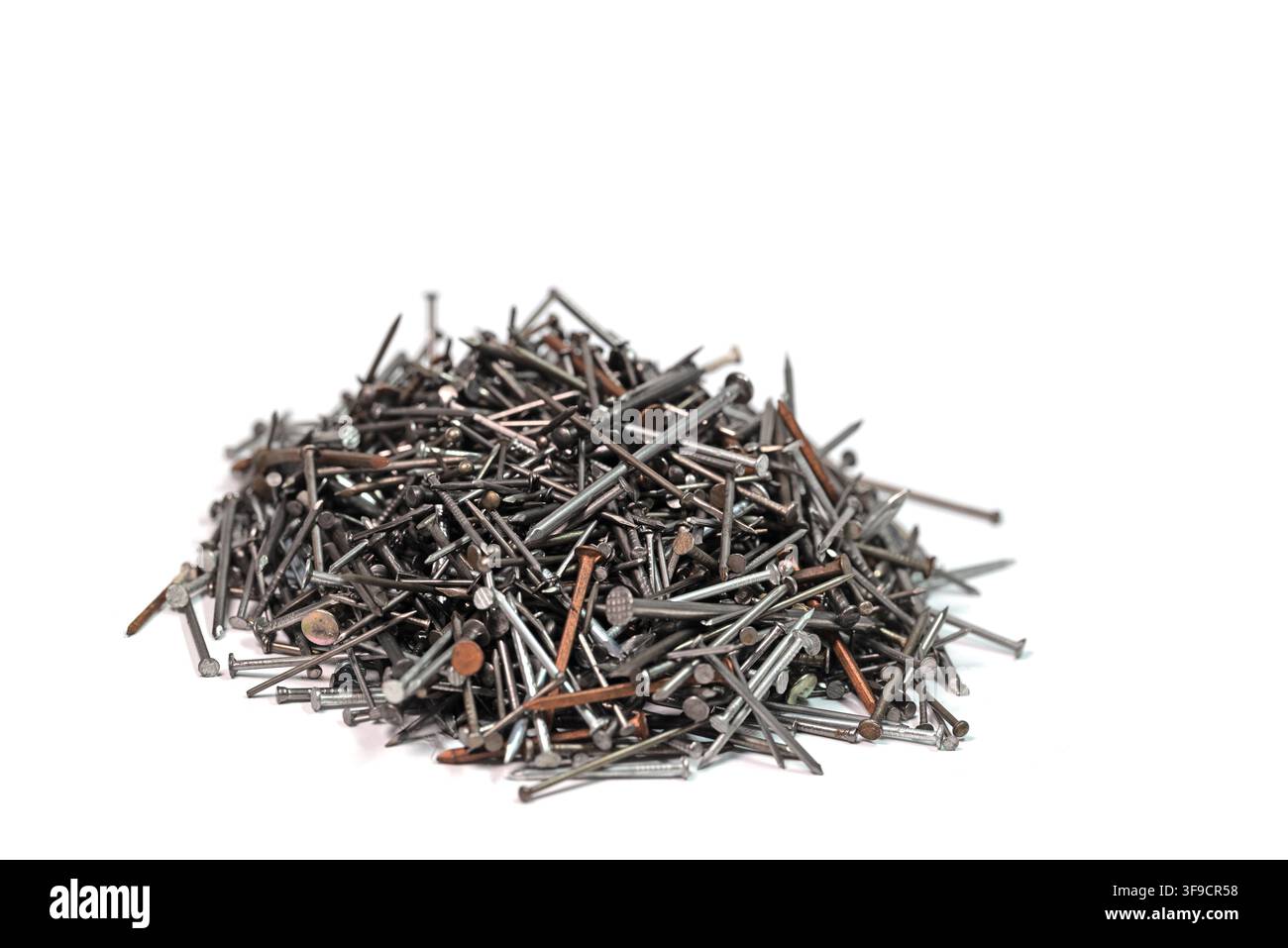 Many different nails against a white background Stock Photo