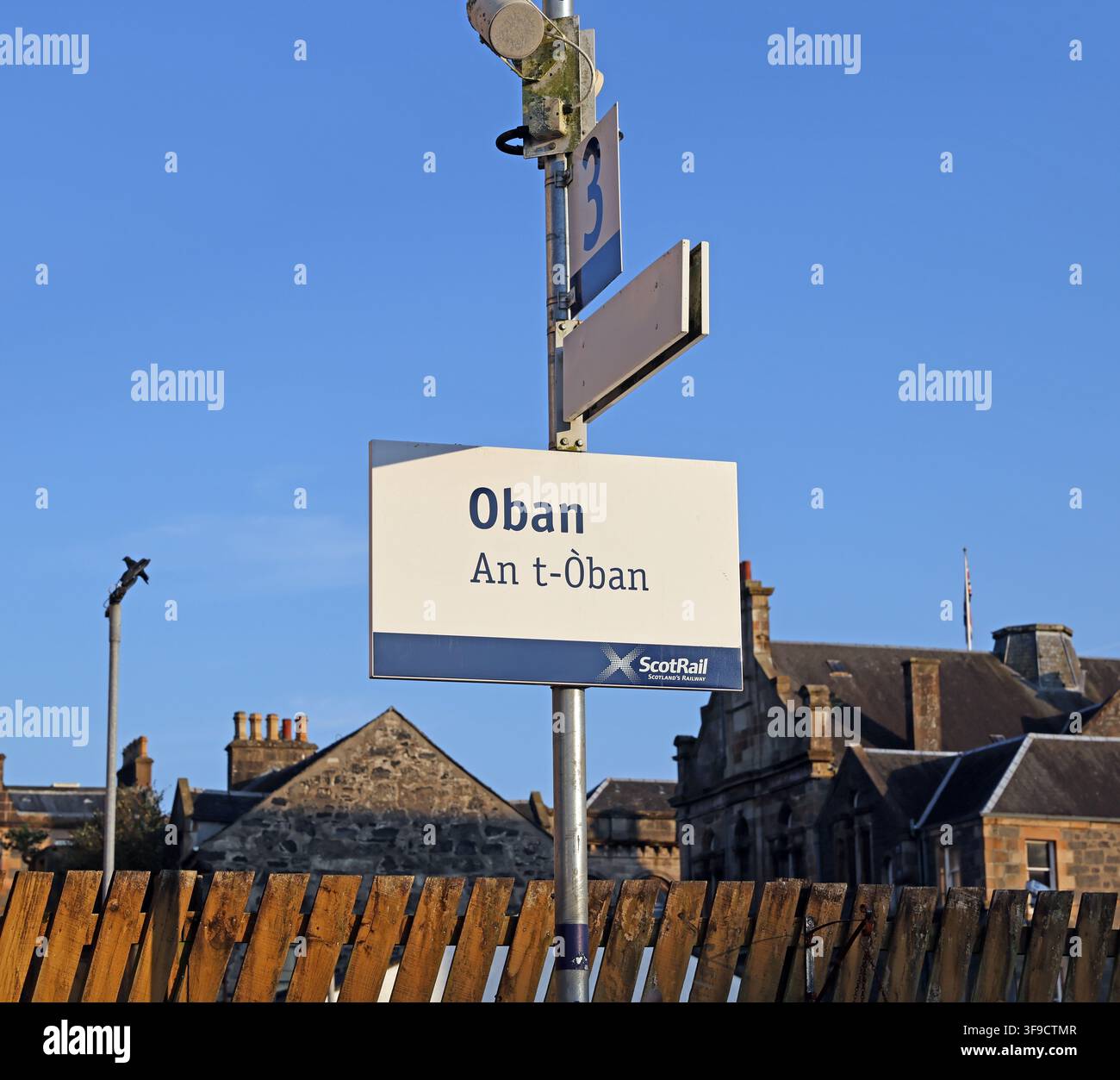 Bilingual Oban railway station sign in English and Gaelic, Scotland, UK. Stock Photo