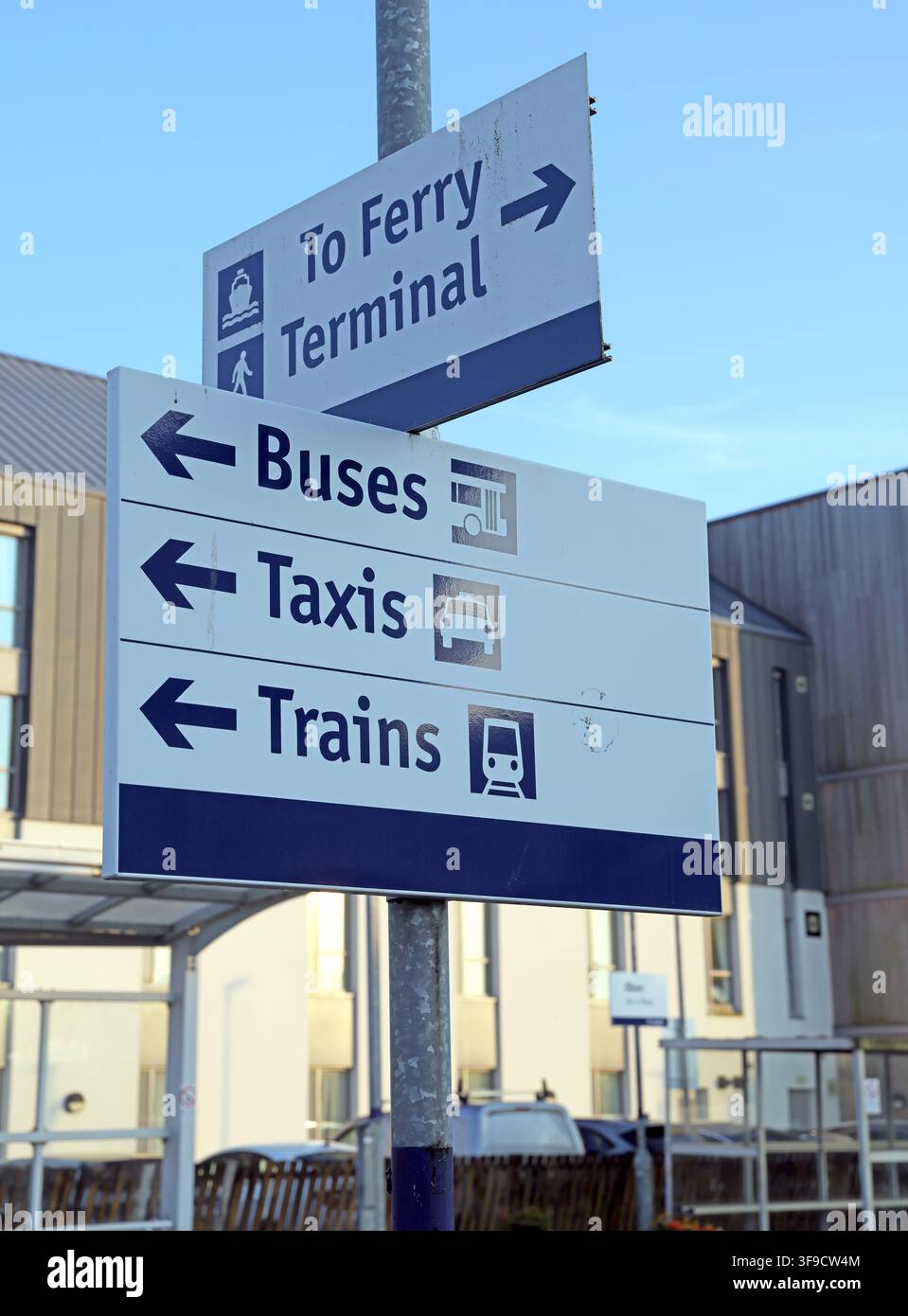 Directional sign for ferry terminal, buses, taxis and trains in Oban, Scotland, UK. Stock Photo