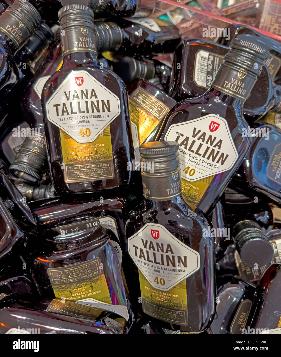Miniature bottles of Vana Tallinn Estonian liqueur in a duty-free display. Stock Photo