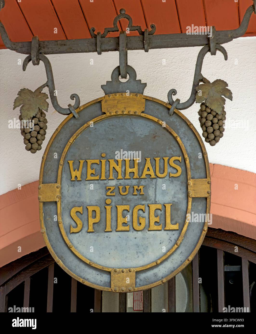 Historic Weinhaus Zum Spiegel hanging sign in Mainz, Germany. Stock Photo