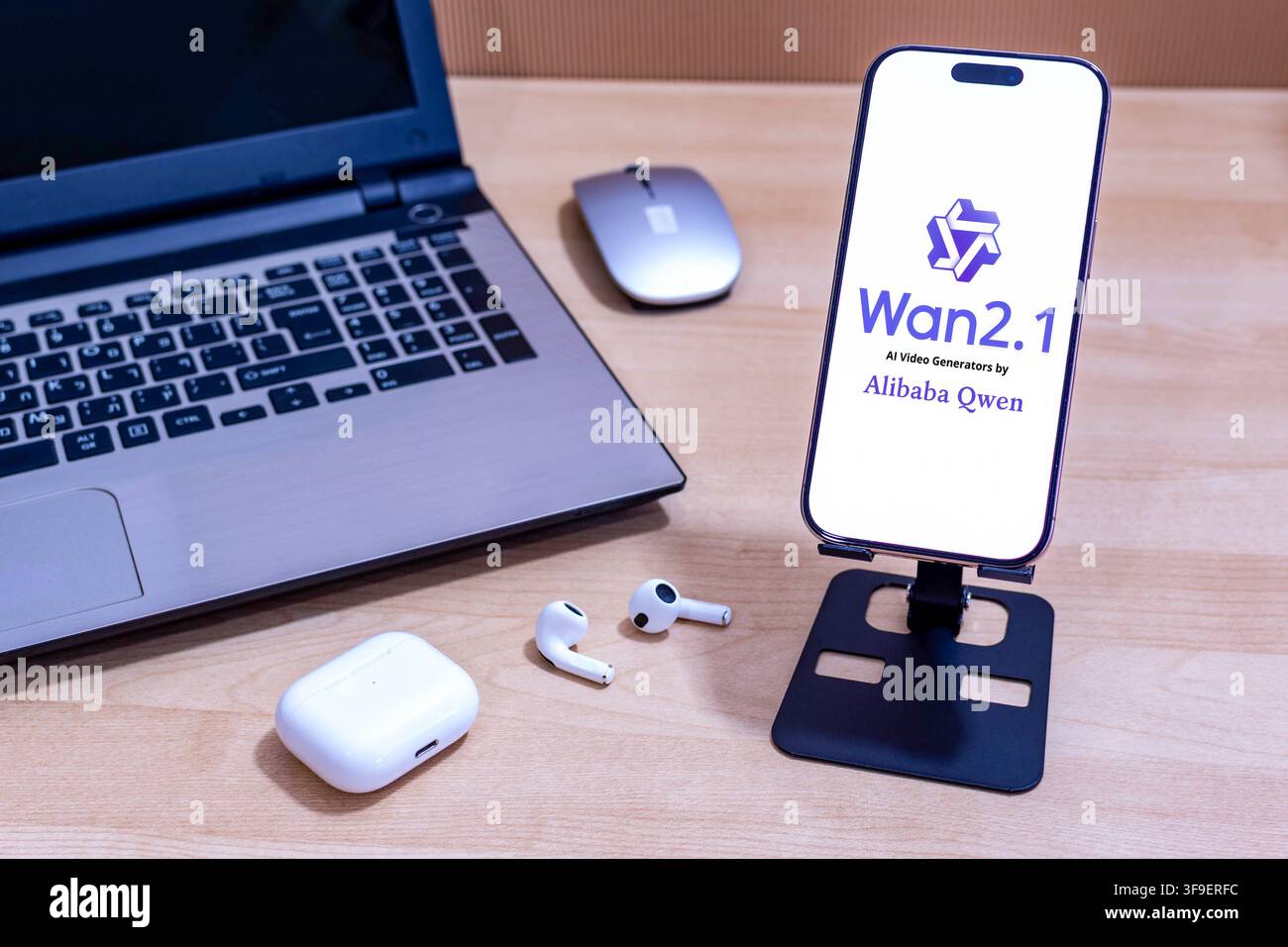 Wan 2.1 AI logo on an Apple iPhone screen. Stock Photo