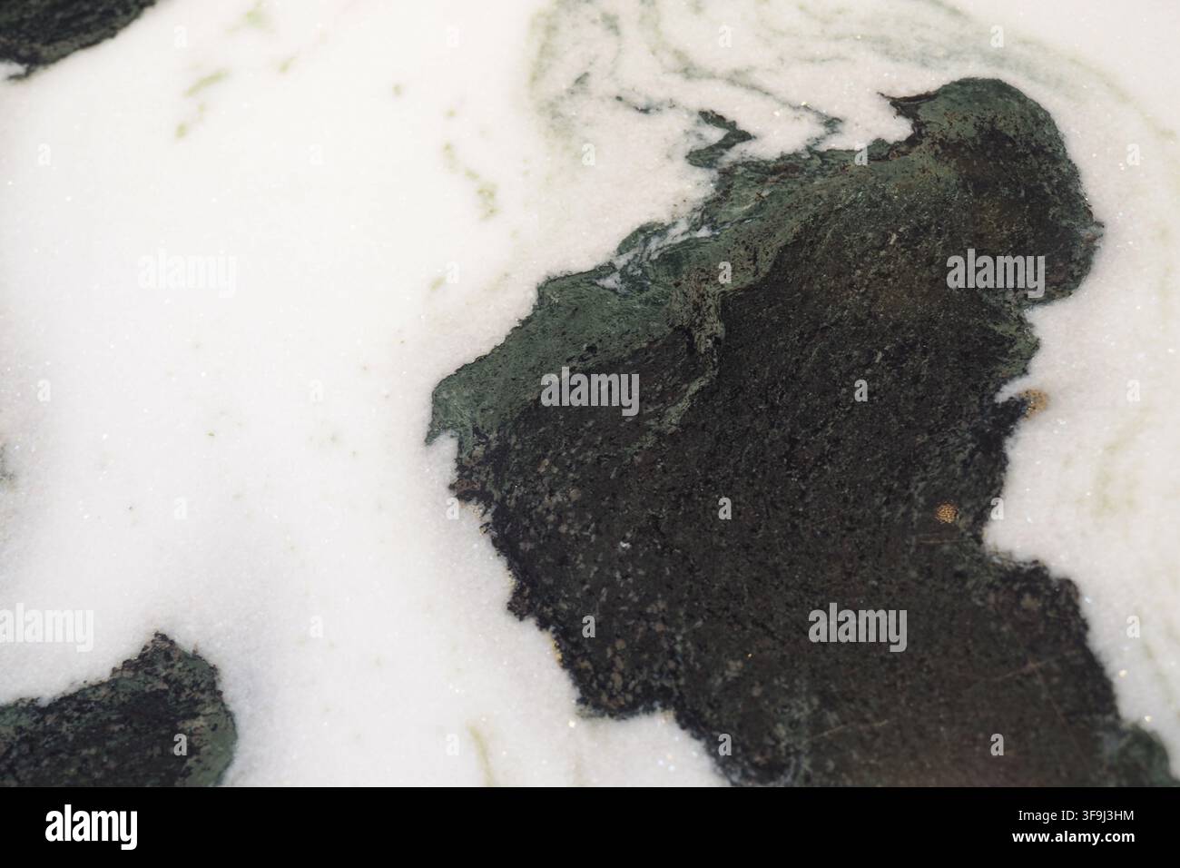 Marble surface with dark and light patterns in close detail Stock Photo