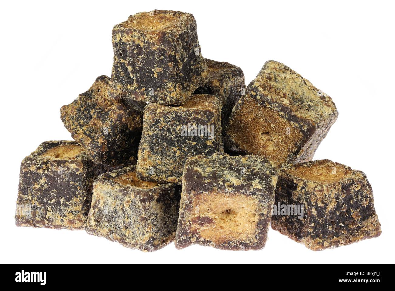 cane sugar jaggery cubes isolated on white background Stock Photo