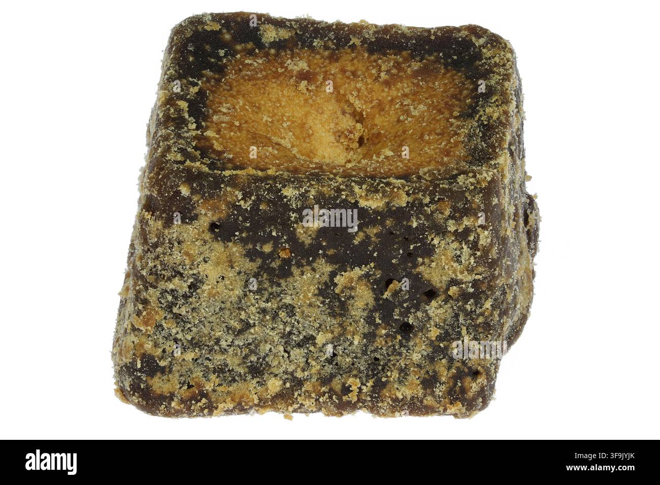 cane sugar jaggery cube isolated on white background Stock Photo
