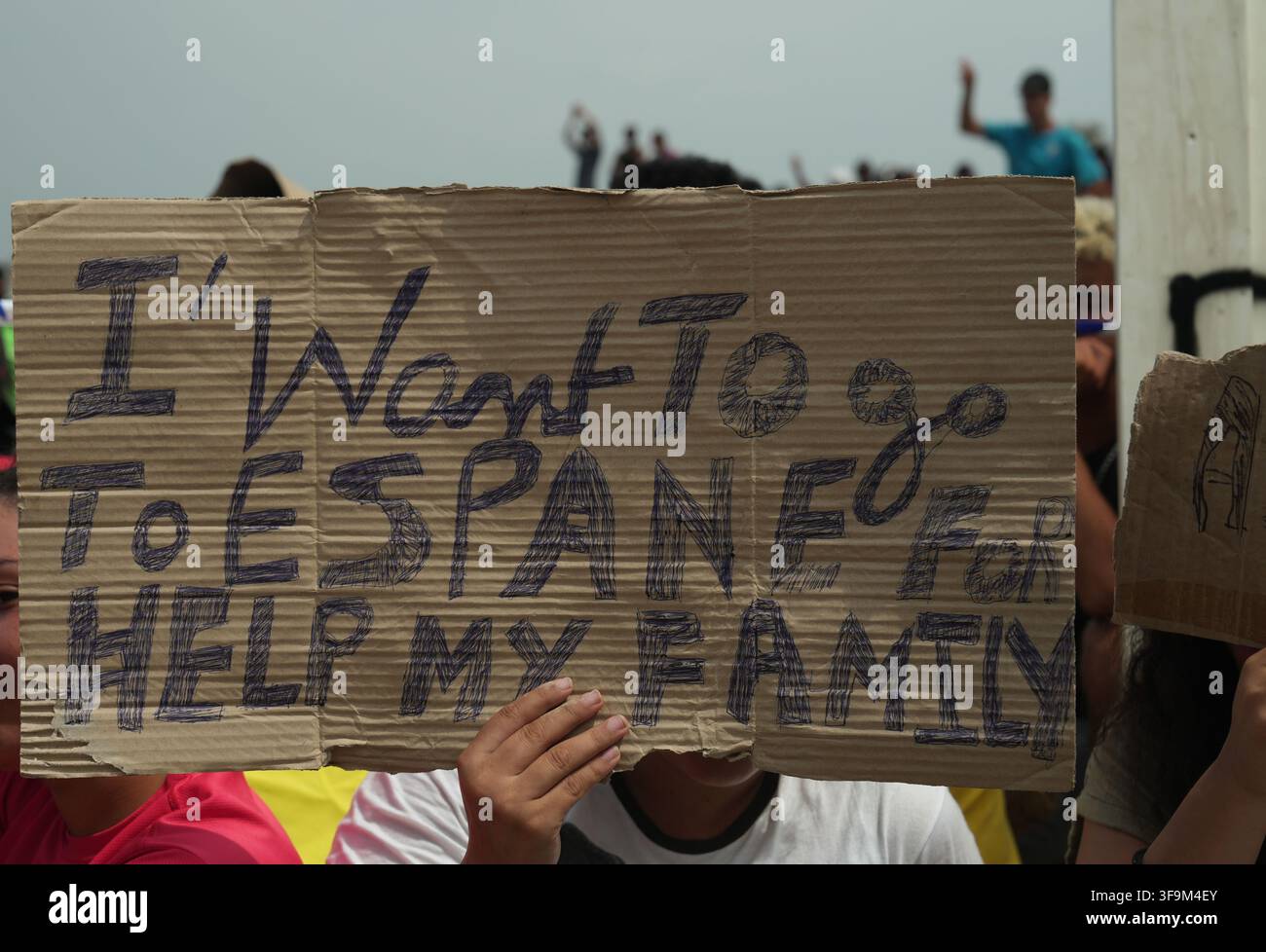 16 August 2026, Spain, Ceuta: Migrants are demonstrating on Playa Del ...