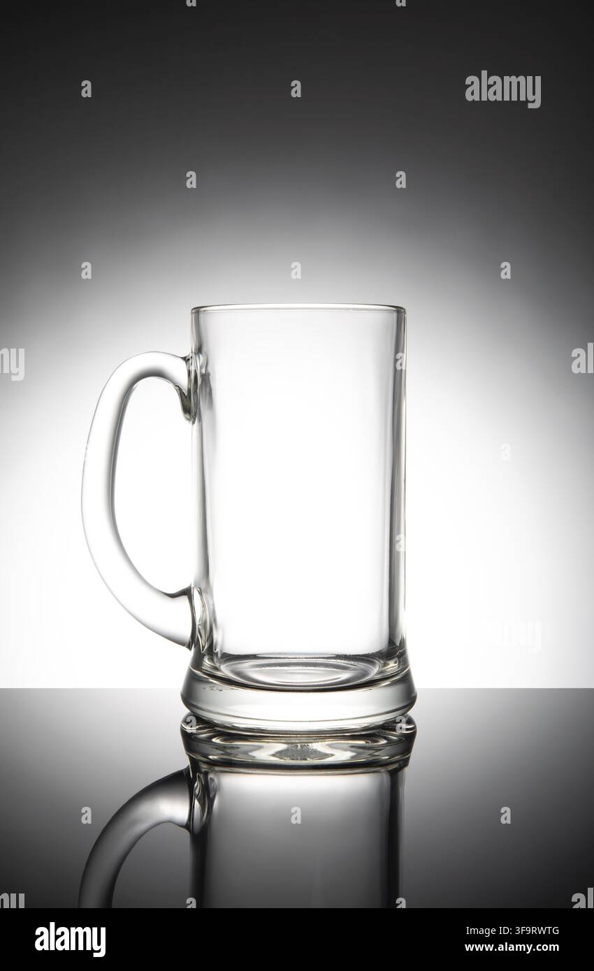 Empty clear beer mug, isolated on white background Stock Photo