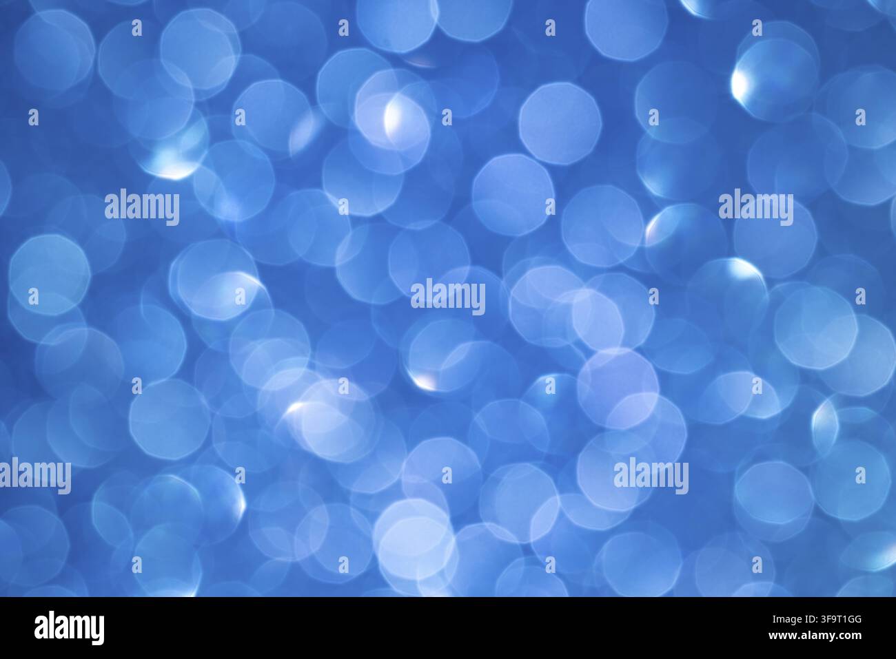 Abstract Blue Bokeh Background: Soft Circular Light Patterns for a Calming Visual Effect Stock Photo