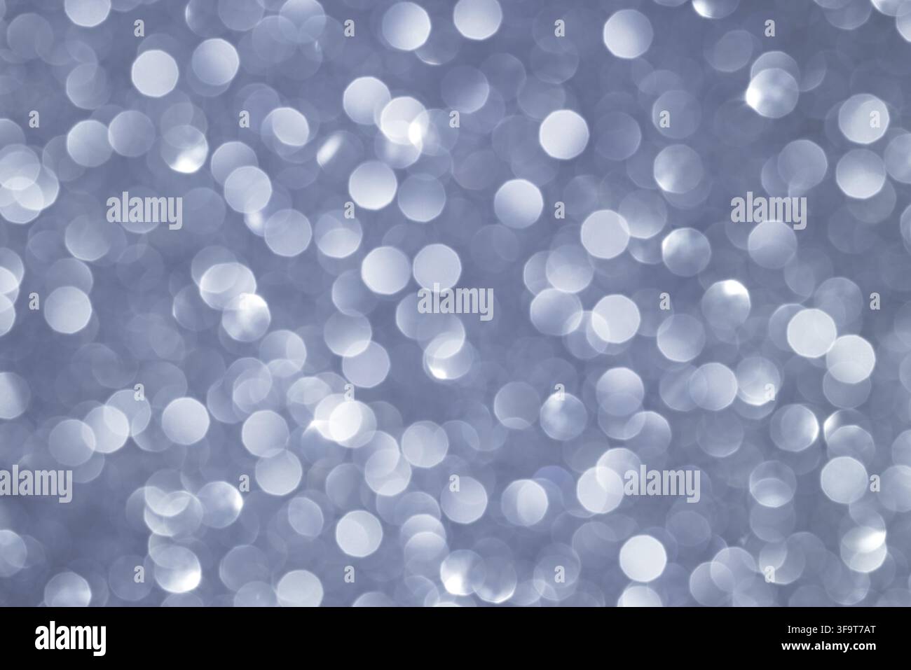 Abstract Silver Bokeh Background with Soft Defocused Light Circles for Elegant Designs Stock Photo