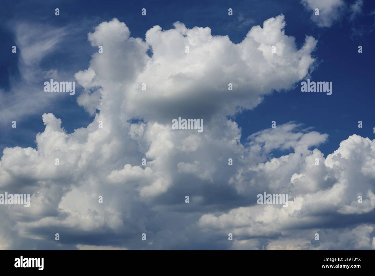 Stormy blue sky and white clouds Stock Photo