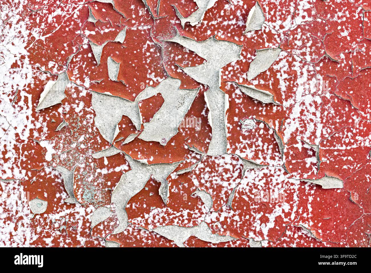 Abstract Pattern of Flaking Paint on Weathered Surface Stock Photo