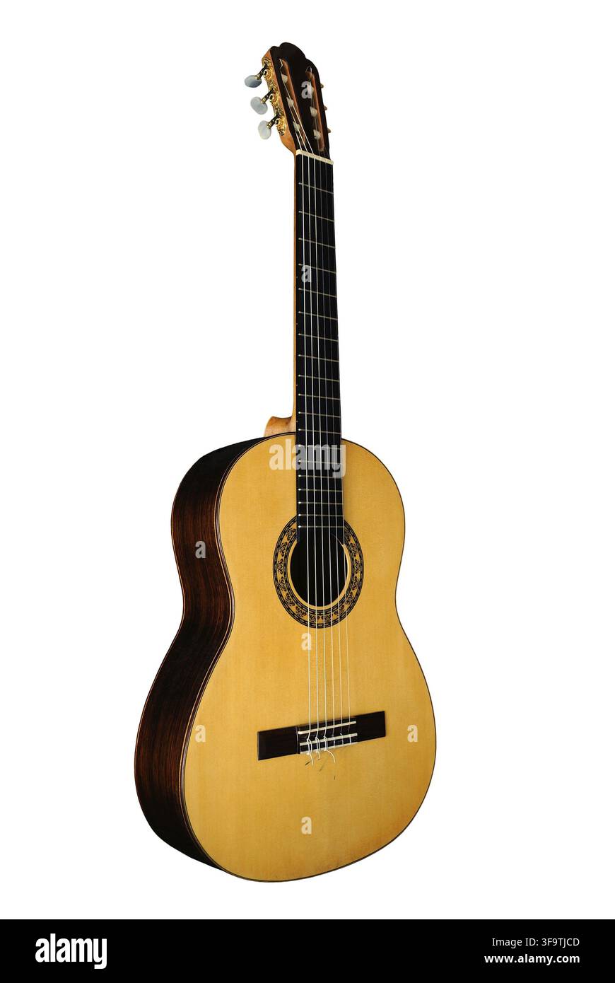 Classical six-stringed guitar with nylon strings, isolated on white background Stock Photo