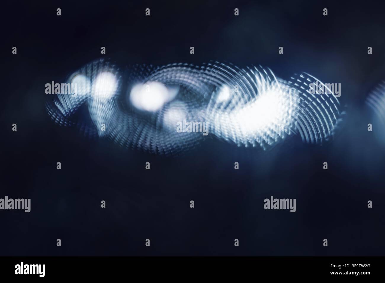 Abstract Light Patterns in Dark Background Featuring Bokeh and Motion Blur Stock Photo