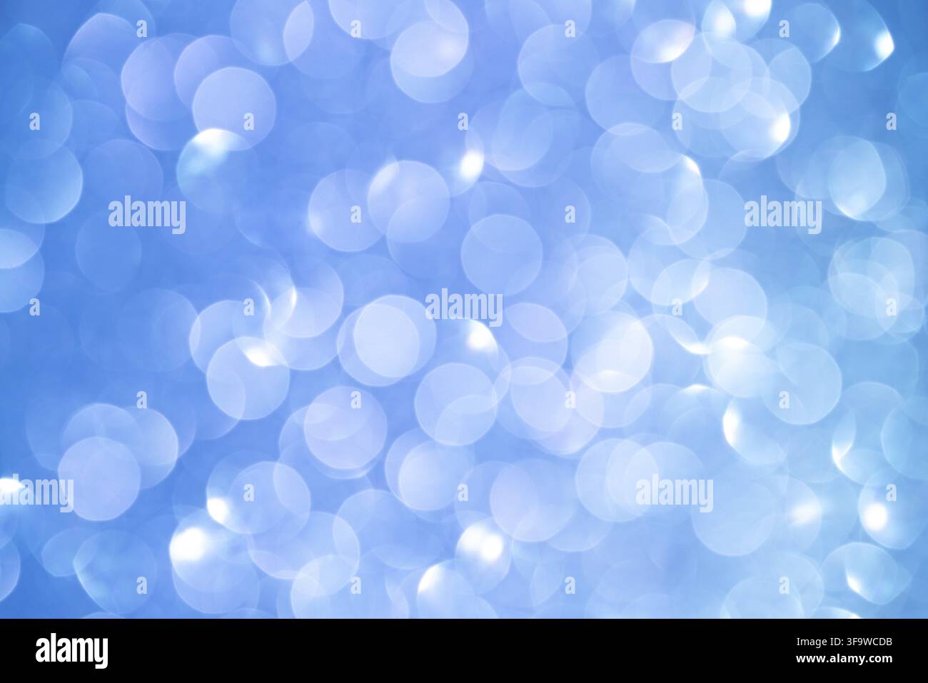 Abstract Blue Bokeh Background with Soft Light Circles for Tranquil Design Stock Photo