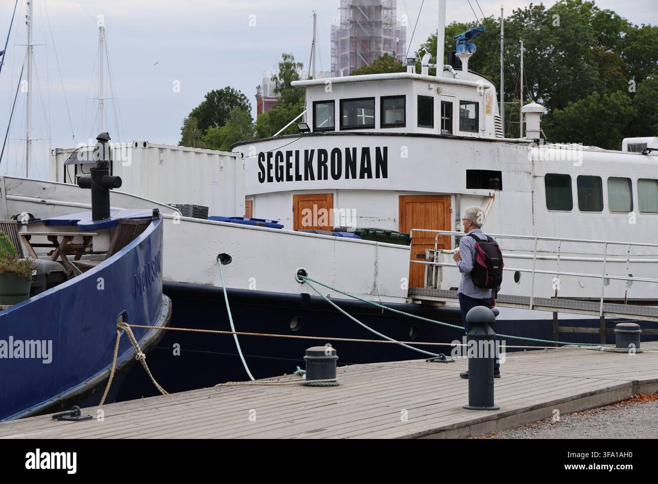 Segelkronan event venue boat moored at Skeppsholmen in Stockholm, Sweden, along the waterfront. Stock Photo