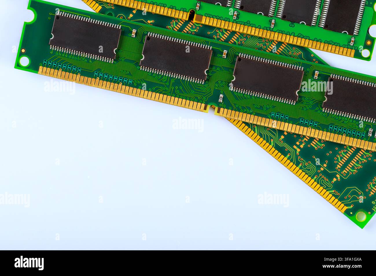 Several computer memory modules are placed RAM modules with green circuit boards integrated chips used for upgrades data processing Stock Photo