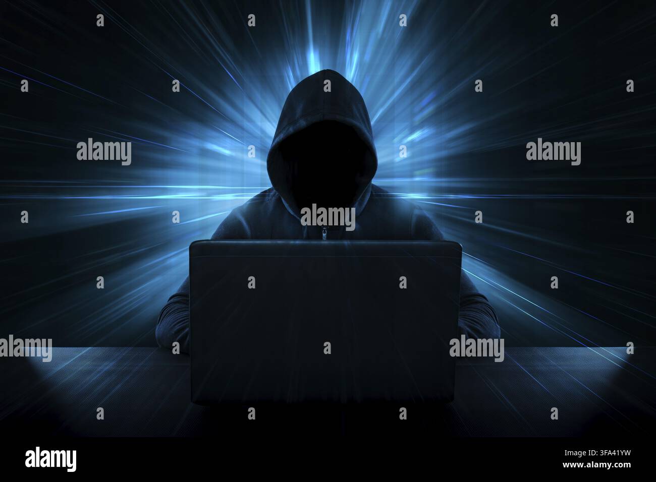 Male thief stealing data from computer - Cyber Crime Concept Stock Photo