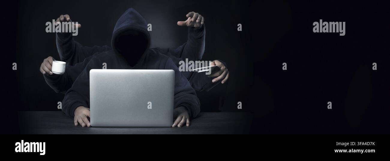A programmer with six hands all a successful workaholic in the workplace Stock Photo