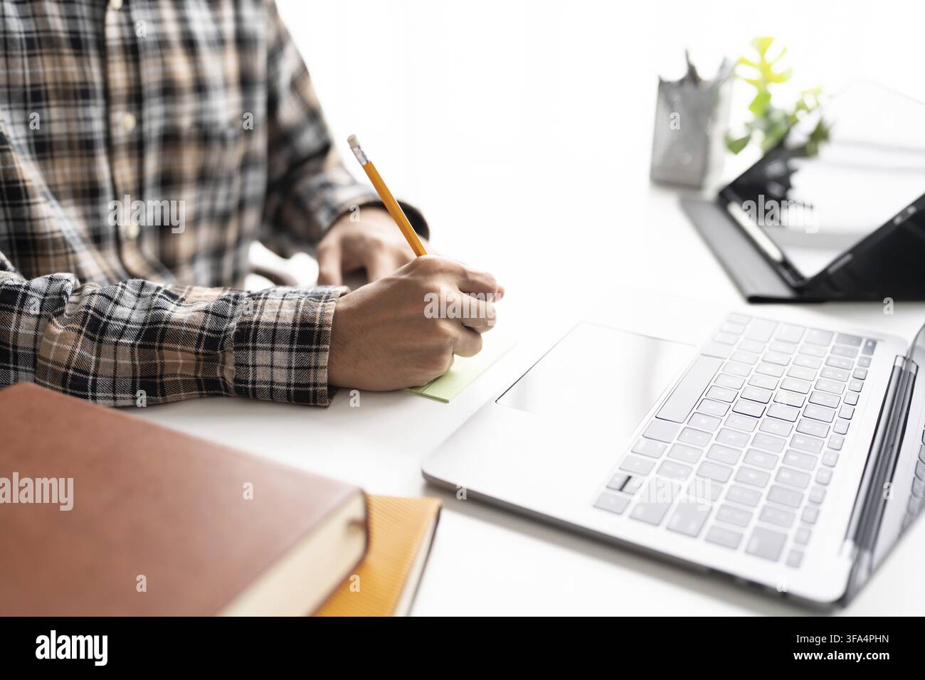 Online education and remote teaching concept using laptop for virtual classroom learning Stock Photo
