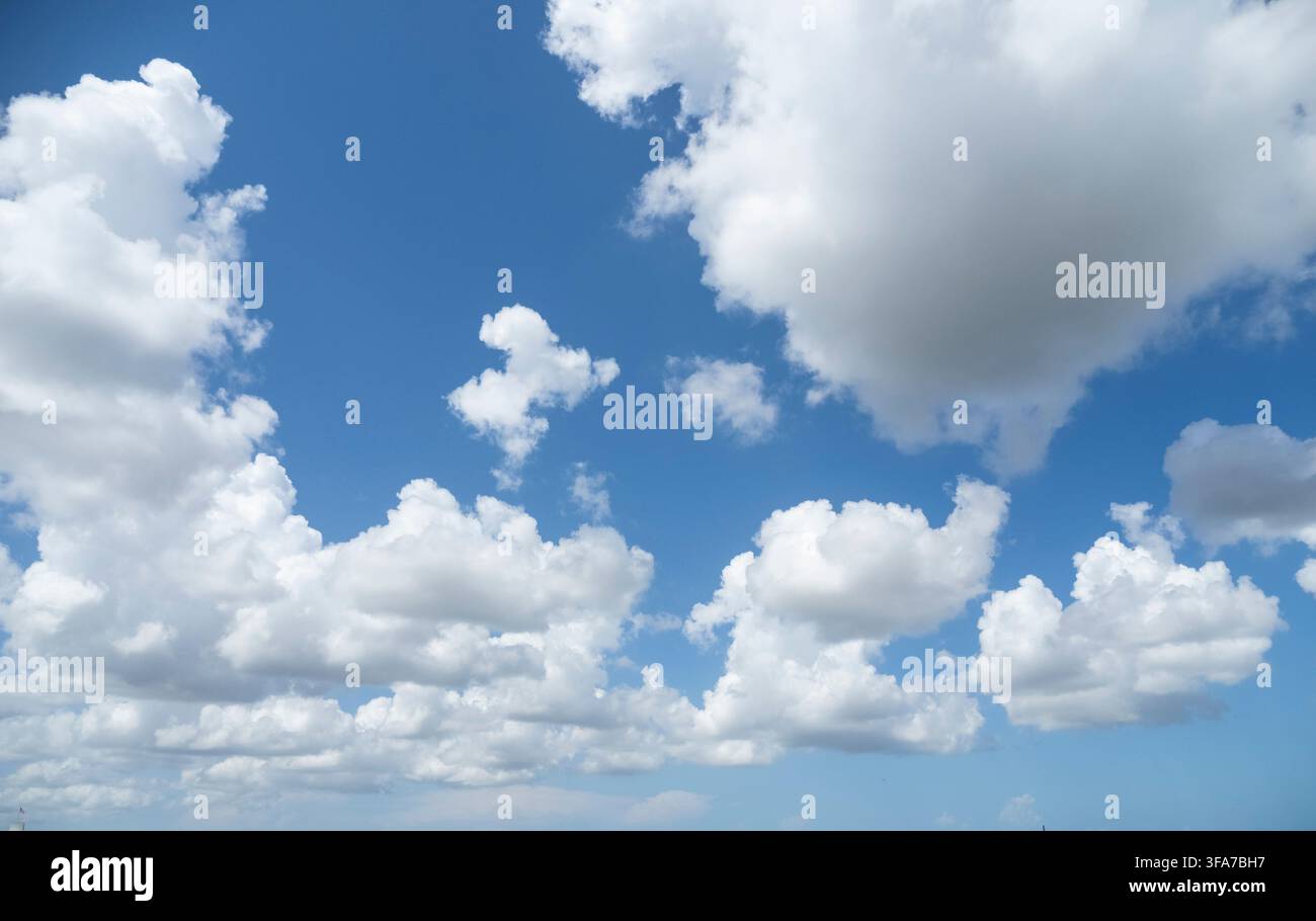 White clouds in a blue sky Stock Photo