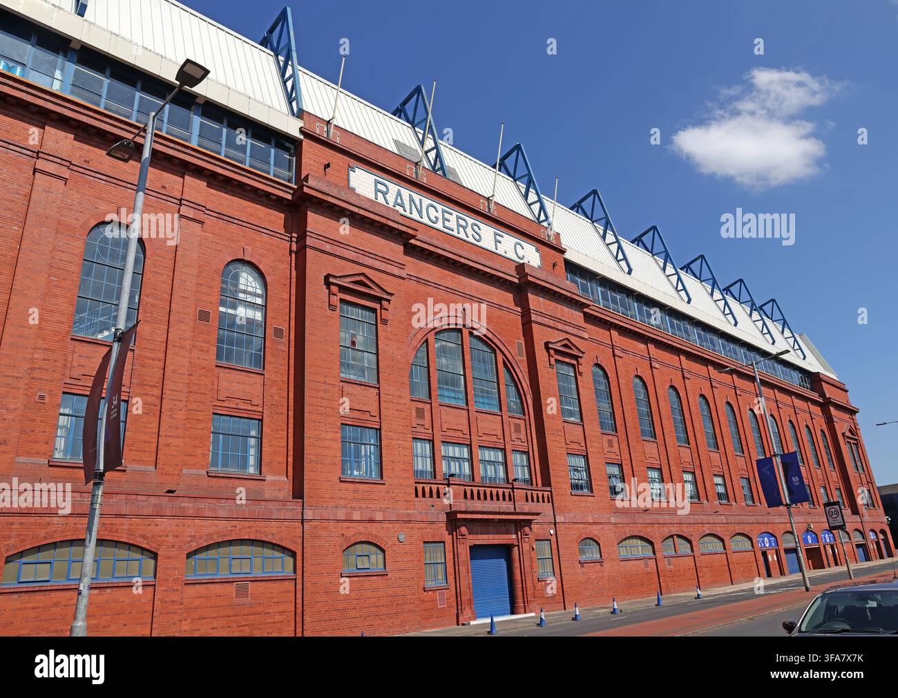 Rangers FC historic Ibrox Stadium Main Stand under blue sky Stock Photo