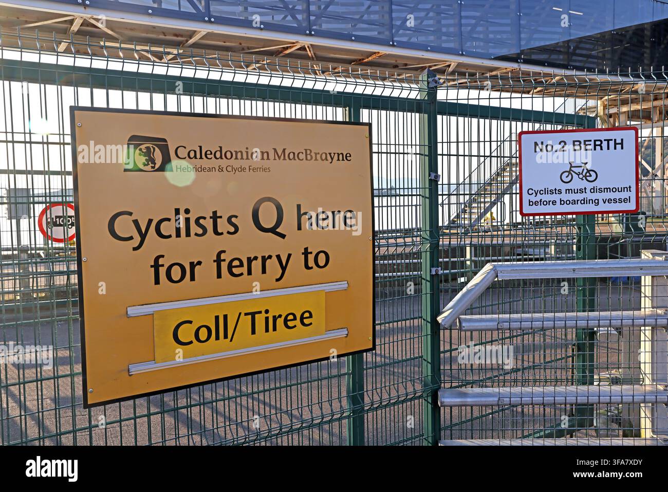 CalMac Oban ferry terminal sign directing cyclists to Coll and Tiree ferries Stock Photo