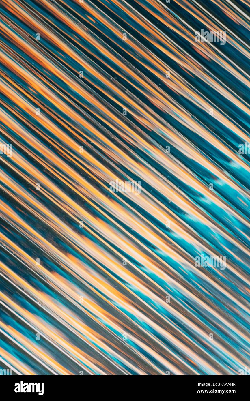 Abstract diagonal lines creating colorful modern pattern. Stock Photo