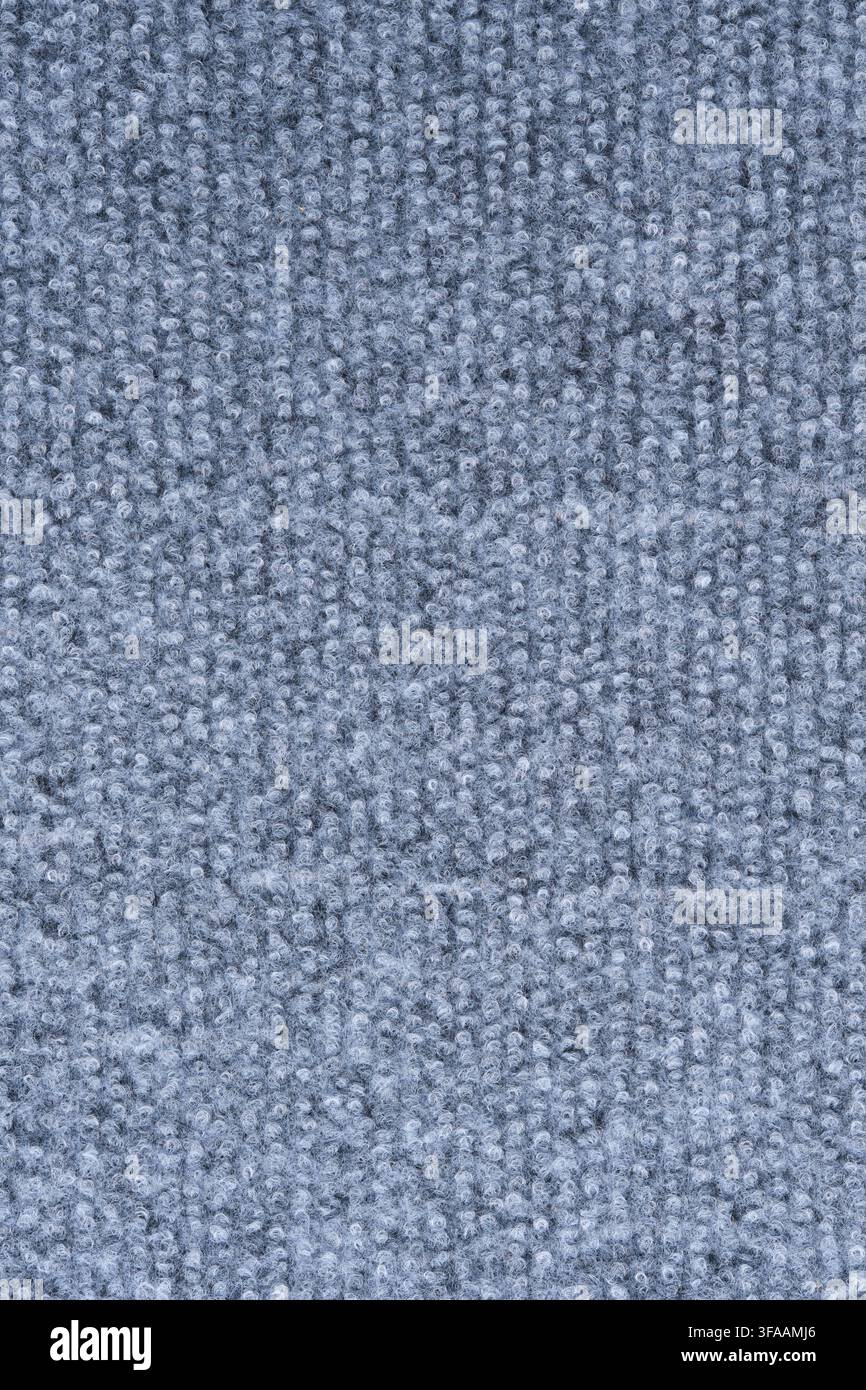 Vertical grey loop carpet fabric texture macro, showing soft woven fiber pattern for design background Stock Photo