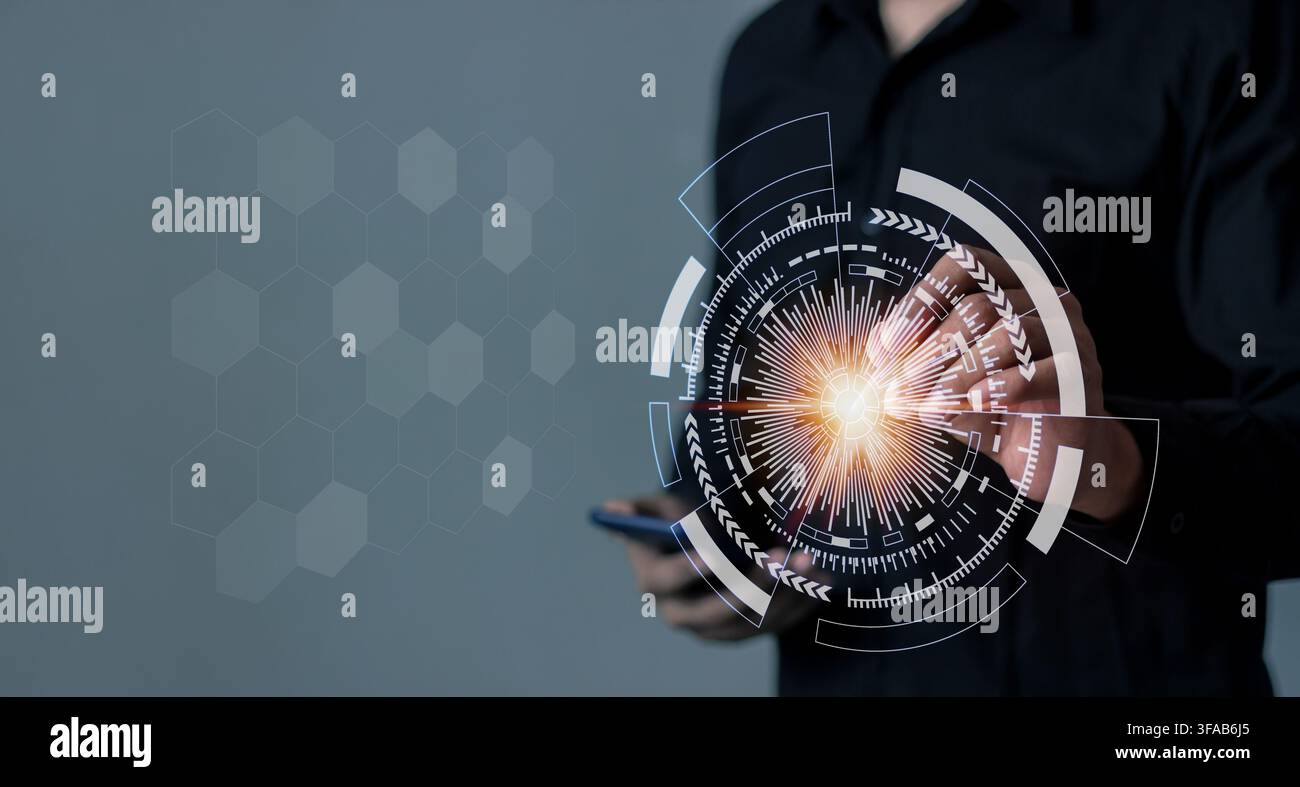 Young man using smartphone hand interacting with futuristic digital interface symbolizing innovation and progress. Stock Photo