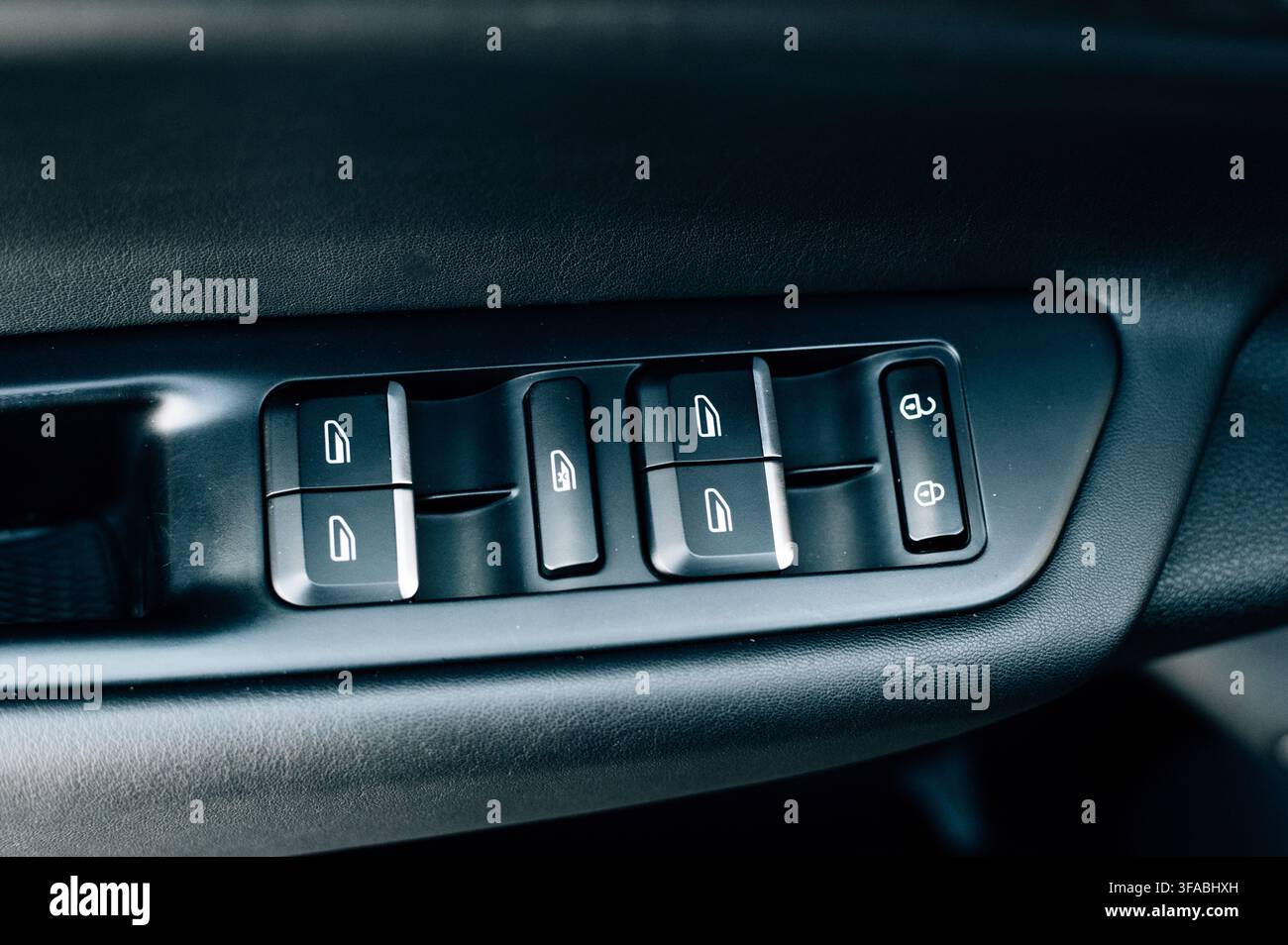 Window control buttons on the door Stock Photo