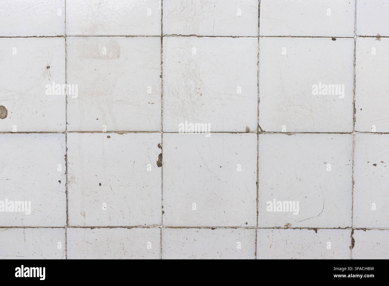 grunge white ceramic tile wall background texture Stock Photo