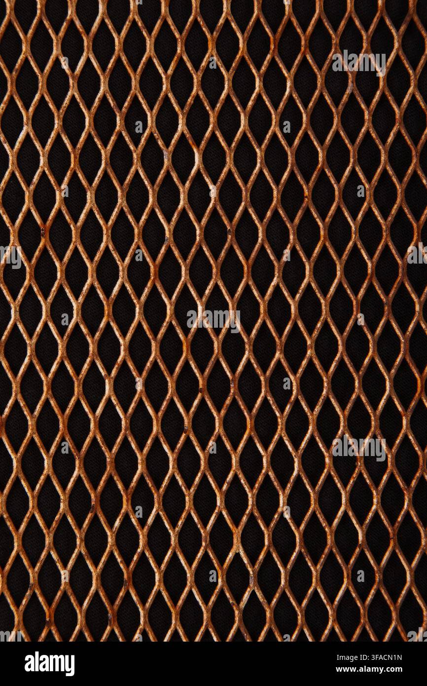 Rusty metallic diamond mesh grid background full frame texture. Stock Photo