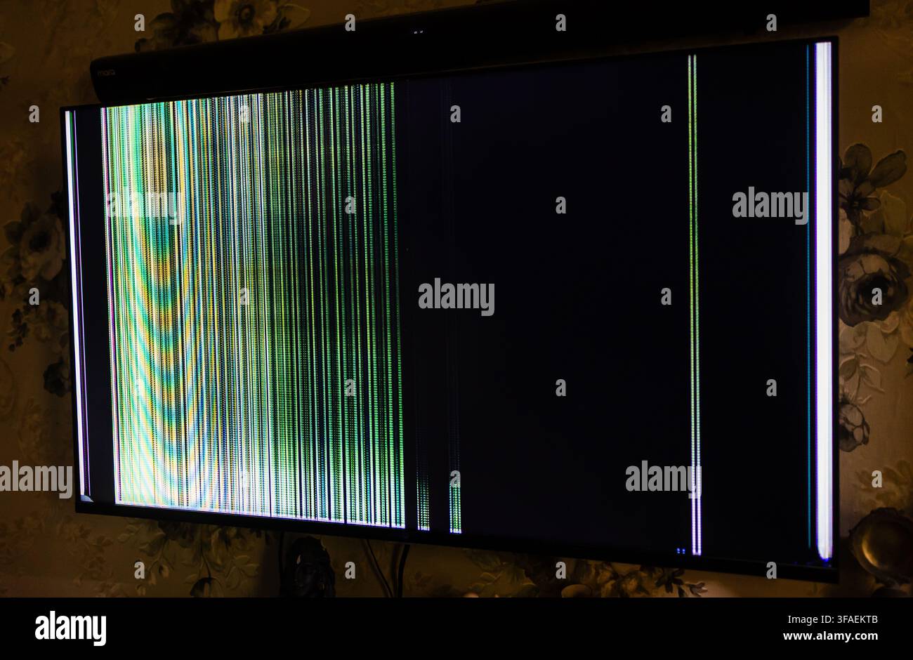 Television Screen With Vertical Colored Stripes Caused By Display Malfunction Stock Photo