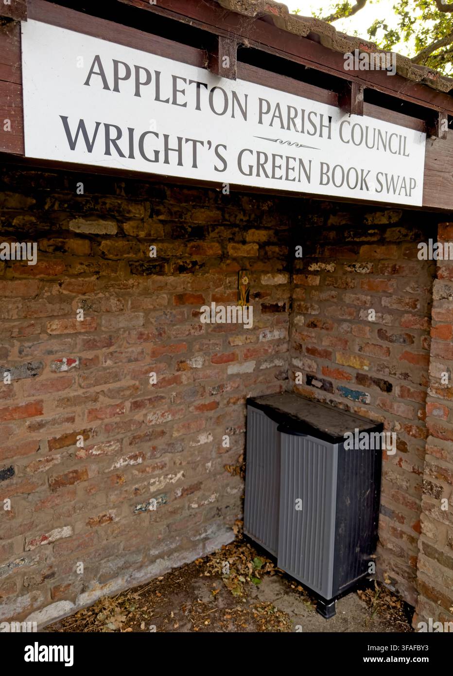 Wright's Green community book share built into a bus shelter near Appleton Thorn, encouraging free reading, reuse and neighbourhood sharing. Stock Photo