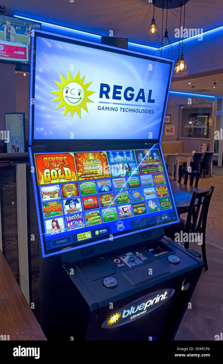 Regal Gaming Technologies gambling machine in a Scottish pub, illustrating casual machine gambling and concerns about addiction and player protection Stock Photo