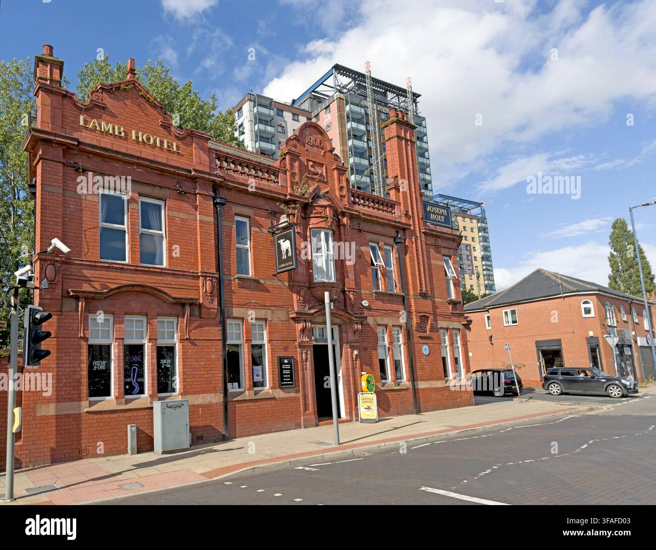 The Lamb Hotel on Regent Street, Eccles, a traditional Joseph Holt pub serving the town centre in Salford, Greater Manchester. Stock Photo