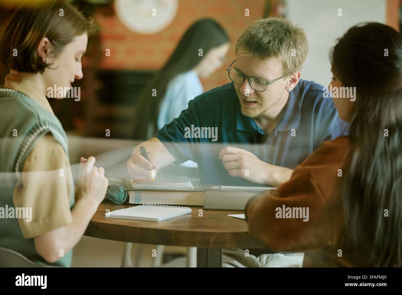 Diverse Students Studying Together at University Campus Library Stock Photo