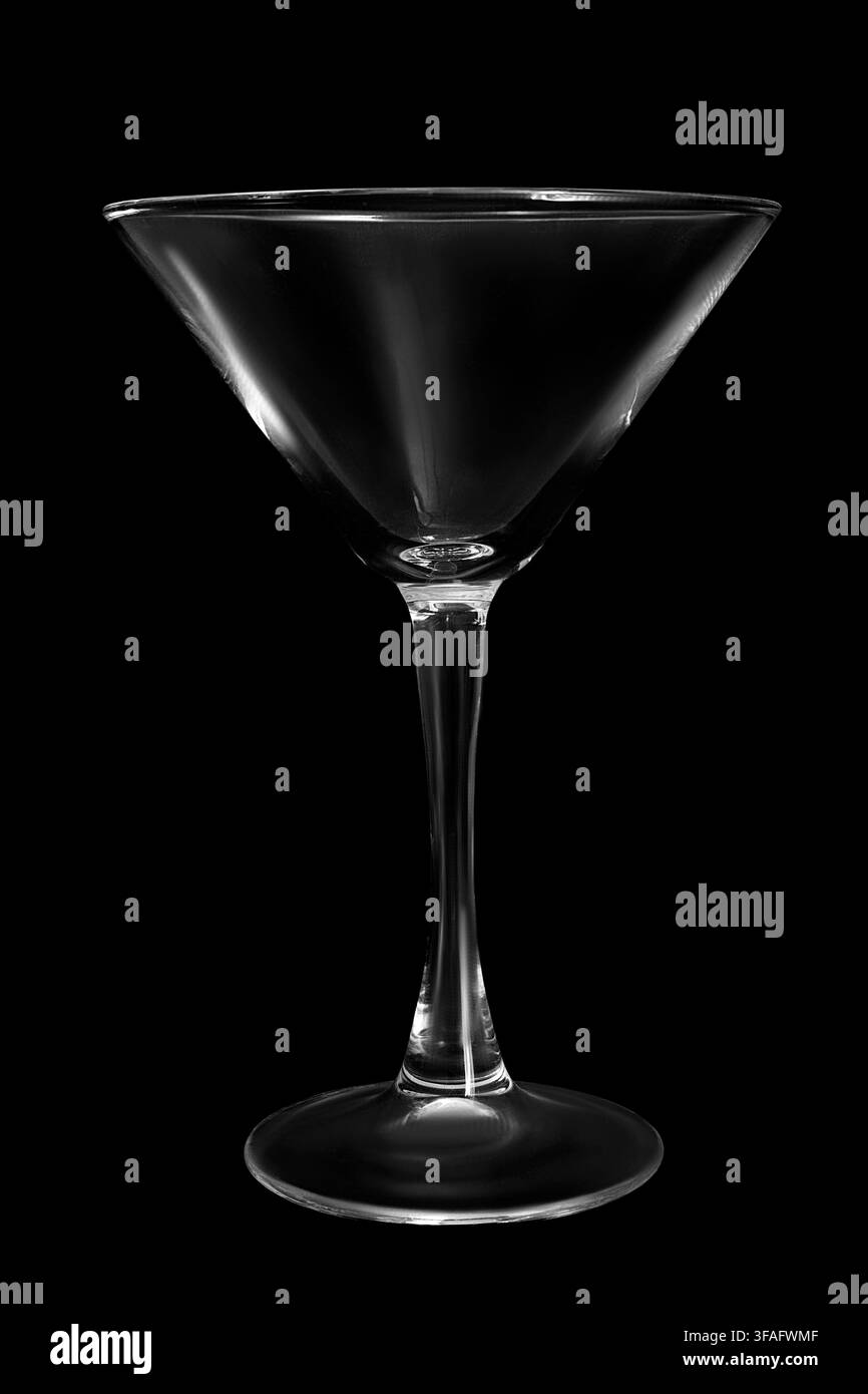 Empty martini glass isolated on black background Stock Photo