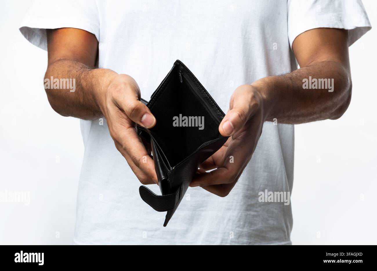 Unrecognizable Black Man Showing Empty Wallet Standing Over White Background Stock Photo