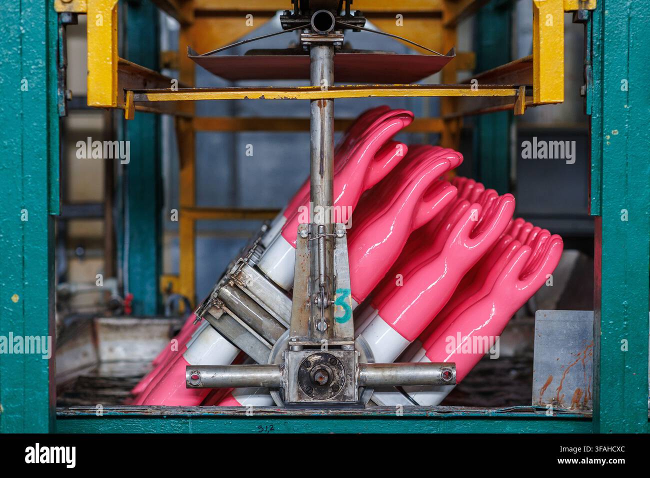 rubber gloves production process. High quality photo Stock Photo