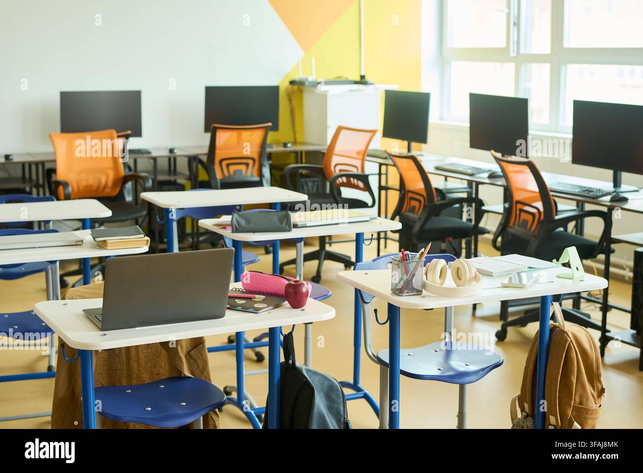 Empty Modern Classroom with Laptops and Computers for Digital Learning Stock Photo