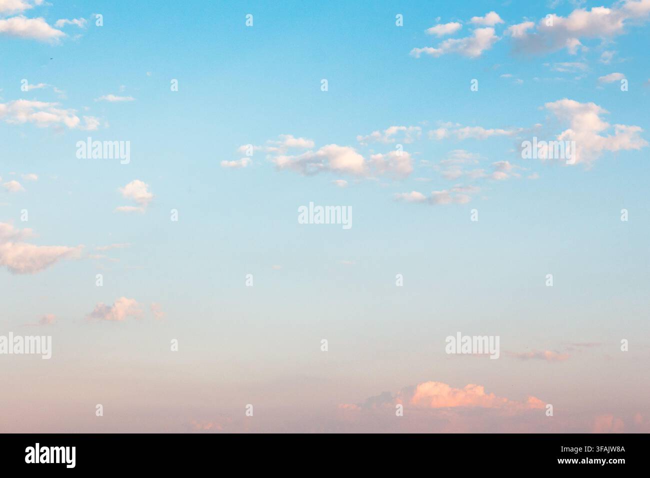 tranquil weather background. nature with fluffy clouds on the blue sky. atmospheric morning wallpaper Stock Photo
