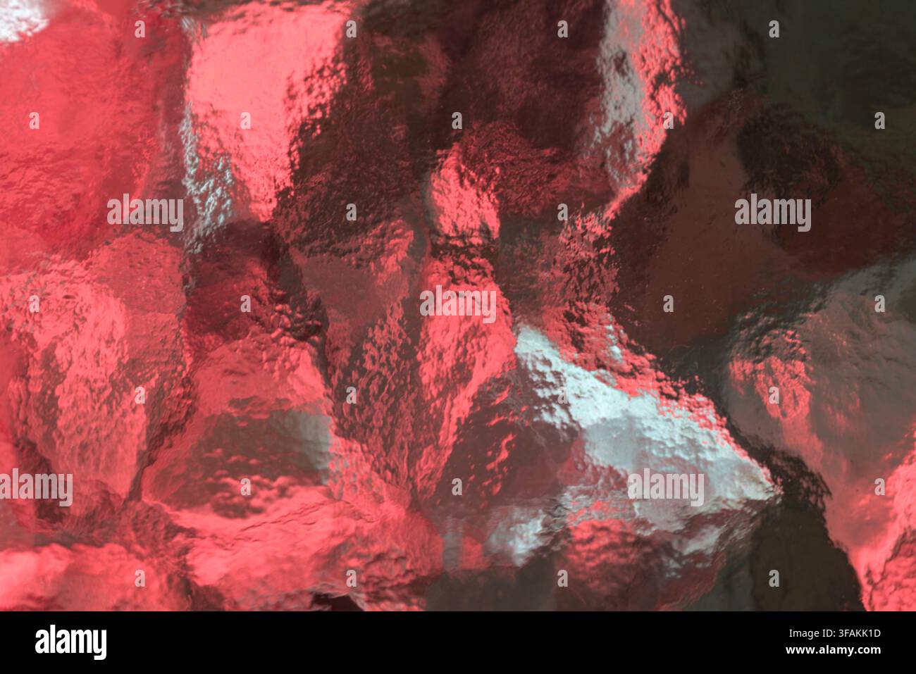 Vibrant red textured glass surface with abstract patterns. Stock Photo