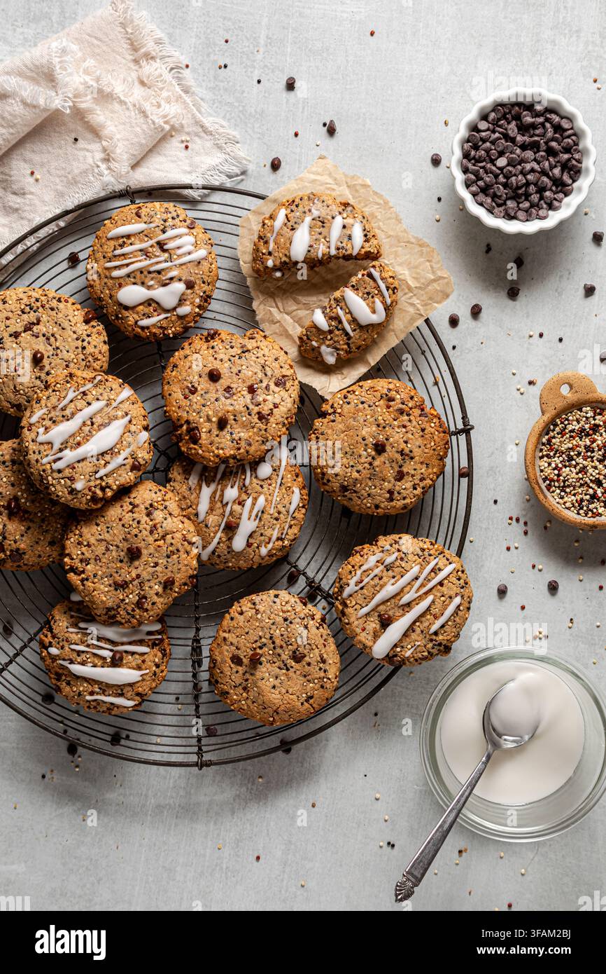 Homemade quinoa chocolate chip cookies on a cooling rack. Stock Photo