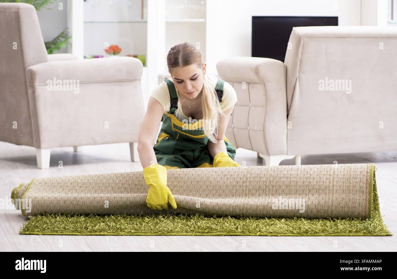 The professional cleaner who cleans carpets Stock Photo