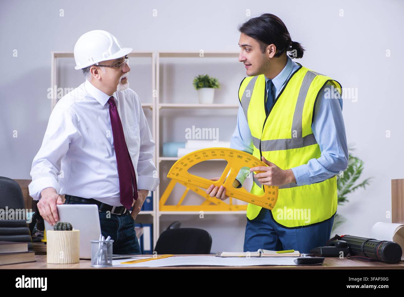 Two architects are working on the project Stock Photo