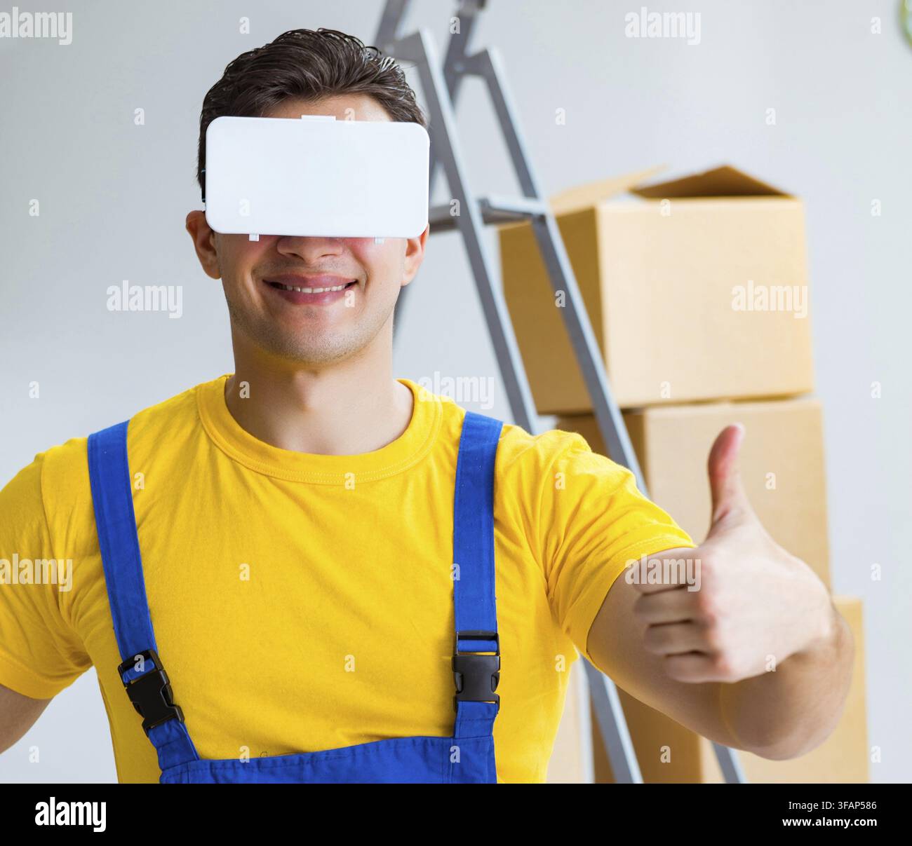 Painter, contractor working with virtual reality glasses Stock Photo