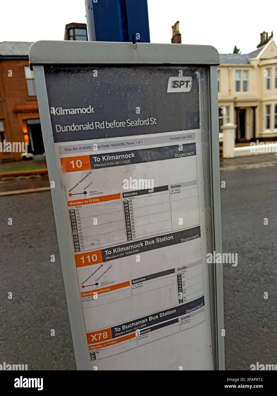 SPT bus stop timetable on Dundonald Road, Kilmarnock, illustrating limited local bus services in East Ayrshire, Scotland, August 2026. Stock Photo